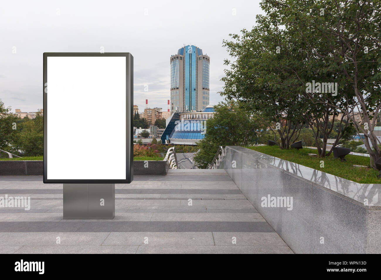 Blank street billboard poster stand mock up in downtown Stock Photo - Alamy