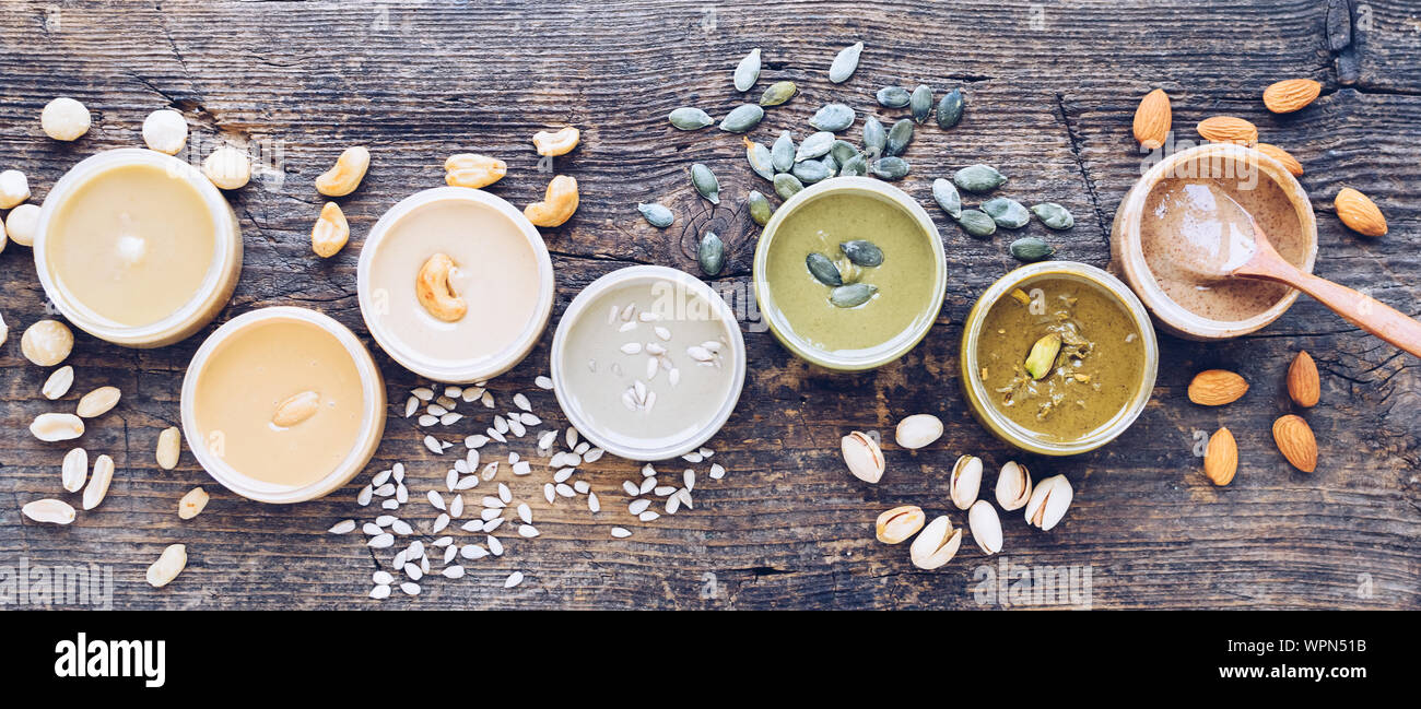 Nuts and seeds butter with ingredients. Homemade raw organic peanut