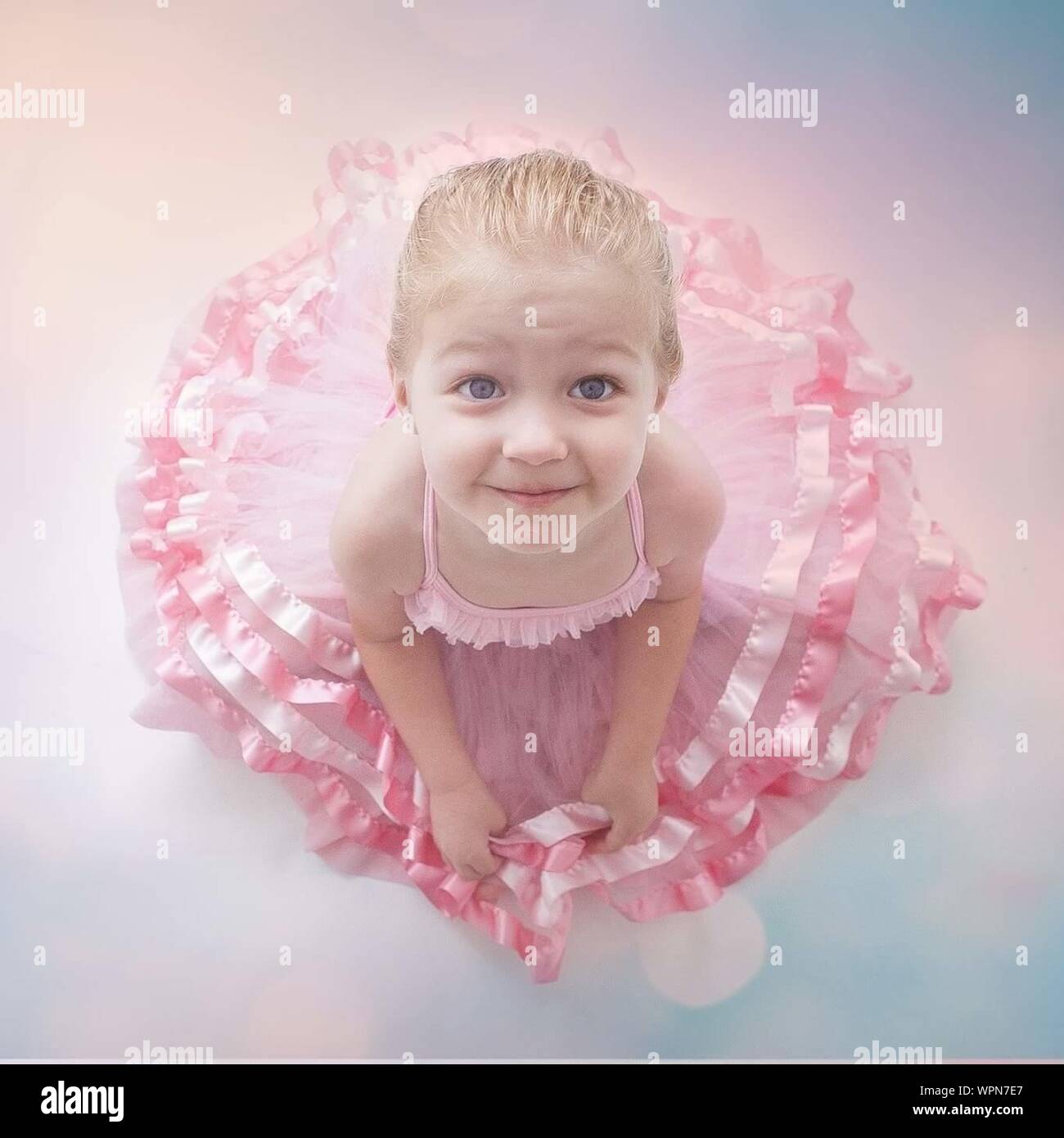 Girl wearing pink dress hires stock photography and images Alamy