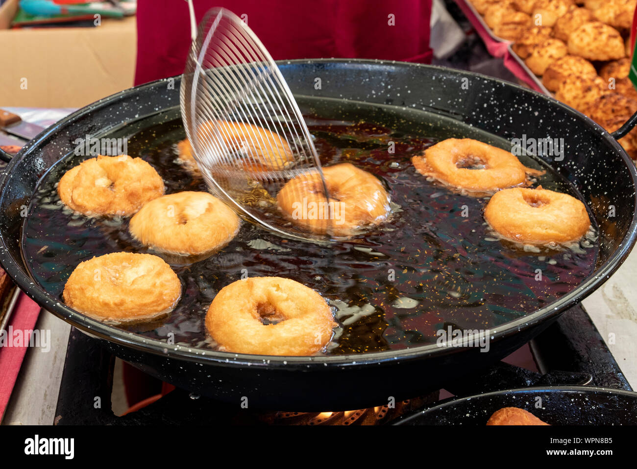 Preparation of pancake donuts, typical of Amorebieta, Biscay, Spain Stock Photo