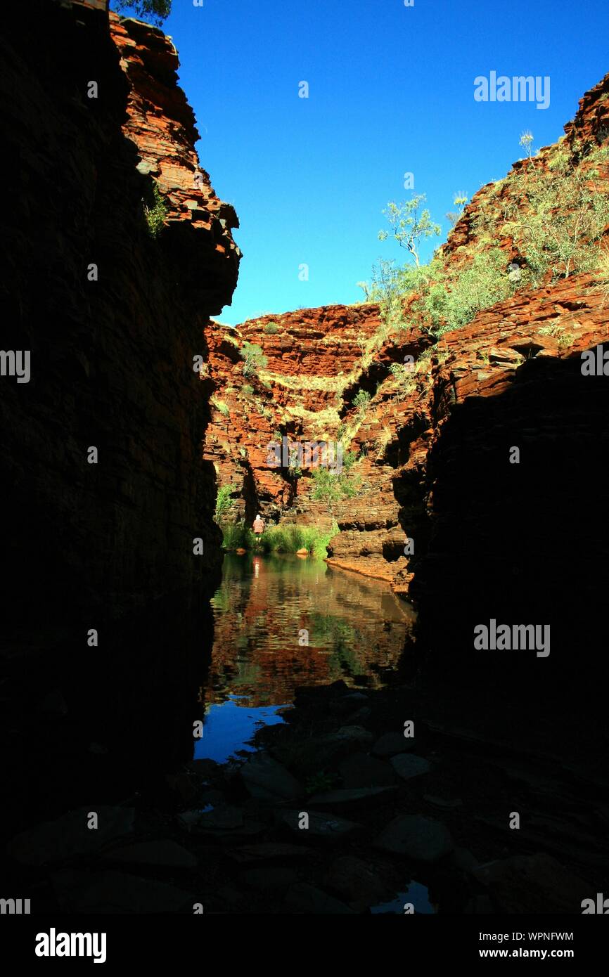 Hiking and swimming in Karijini National-Park, Western Australia with beautiful rock formations Stock Photo