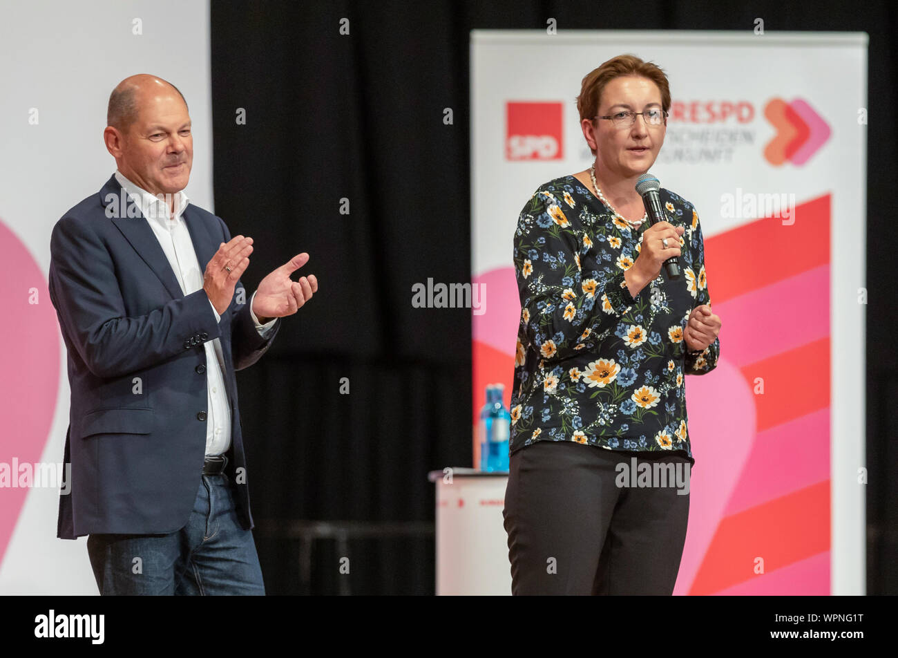 02 September 2019, Hessen, Friedberg: Olaf Scholz (SPD), Federal Minister of Finance, and Klara Geywitz (SPD), members of the Brandenburg state parliament, will stand for the election of the new party chair during the SPD regional conference. Photo: Jörg Halisch/dpa Stock Photo