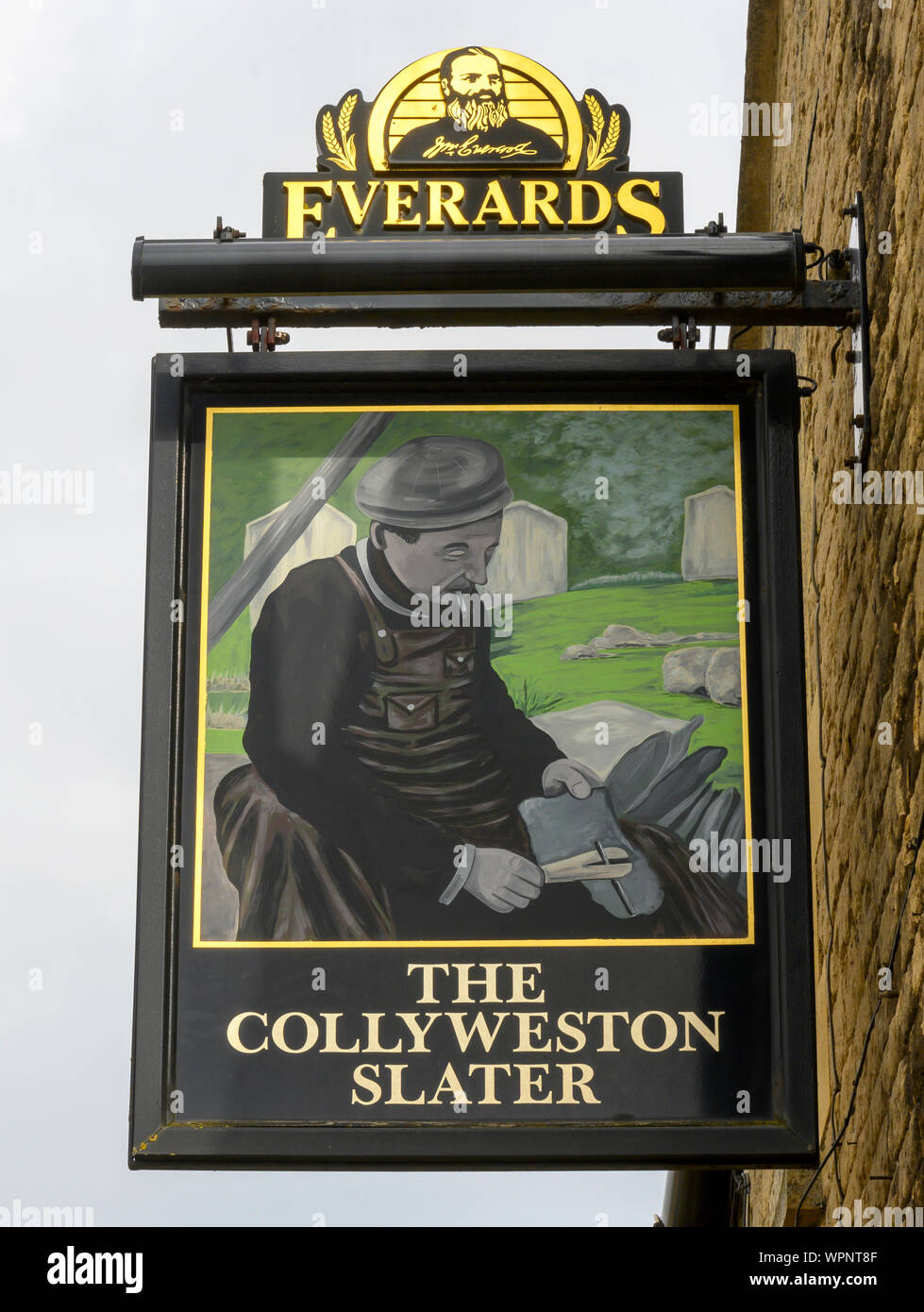 Hanging pub sign at The Collyweston Slater public house, Main Road, Collyweston, Northamptonshire, England, UK Stock Photo