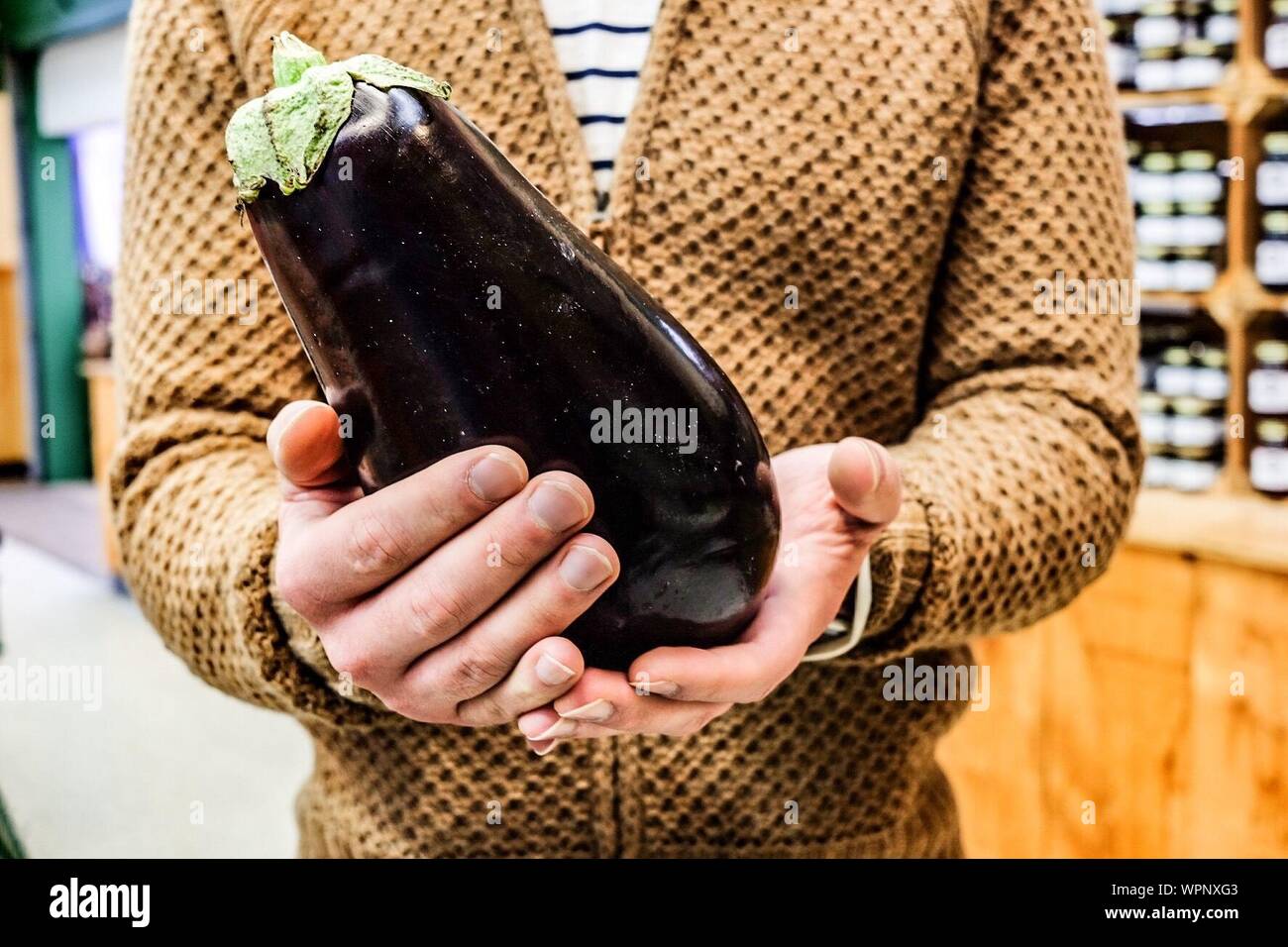 Eggplant sweater hires stock photography and images Alamy