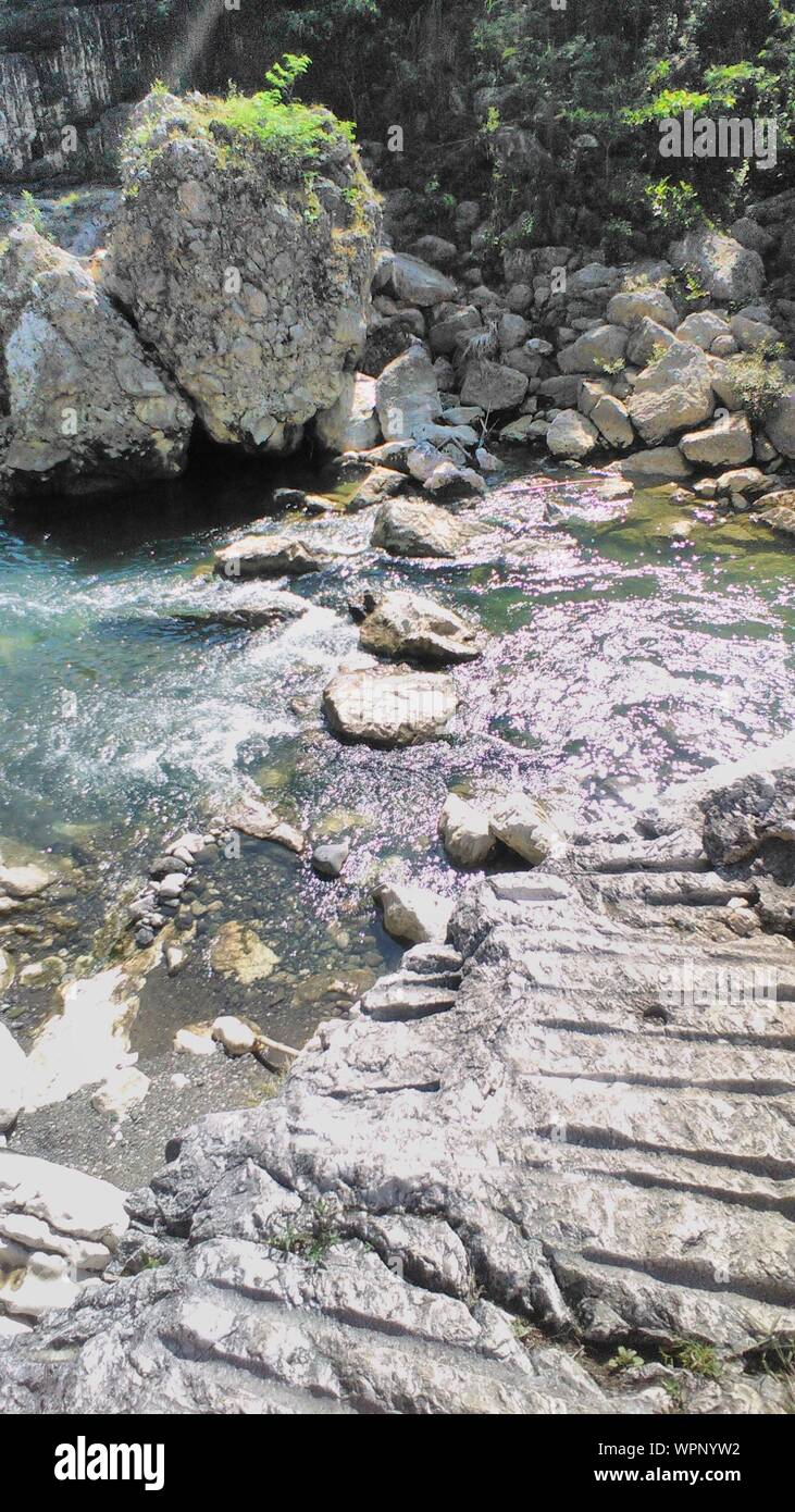 Pebbles in water stream hires stock photography and images Alamy