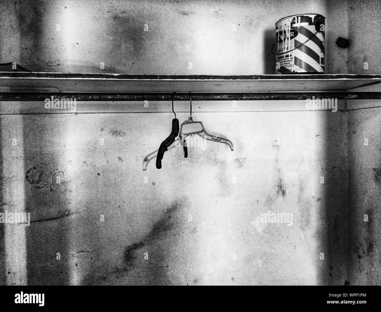 Coat Hanger And Paint Can Stock Photo Alamy