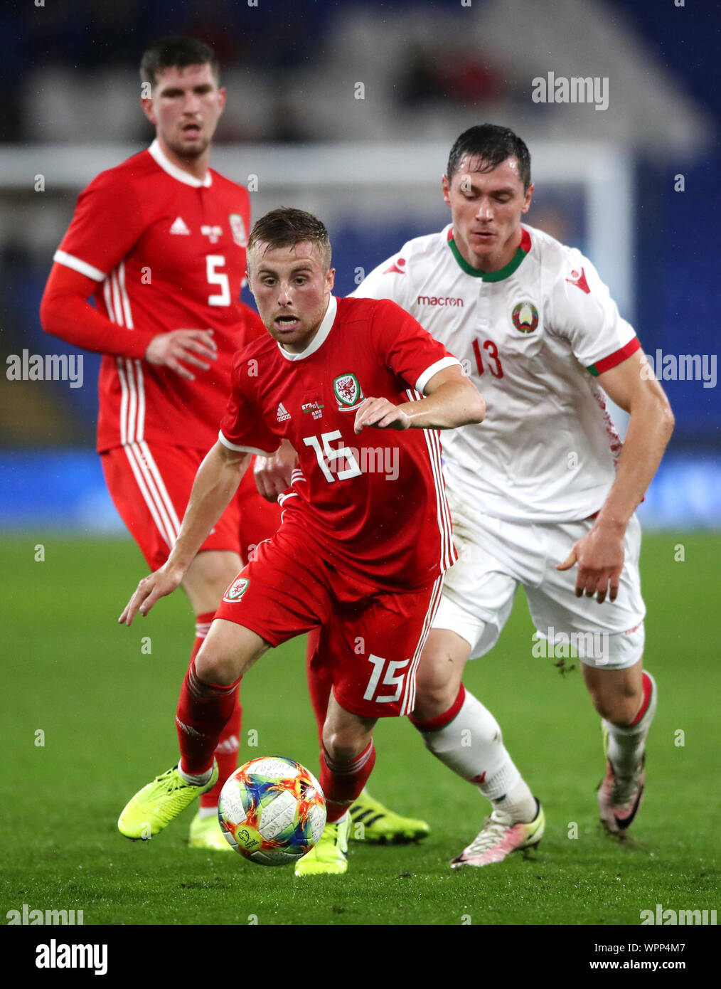 BUDAPEST, HUNGARY - AUGUST 13: (l-r) Tokmac Chol Nguen of Ferencvarosi TC  wins the ball from Arijan Ademi of GNK Dinamo Zagreb during the UEFA  Champions League Third Qualifying Round match between