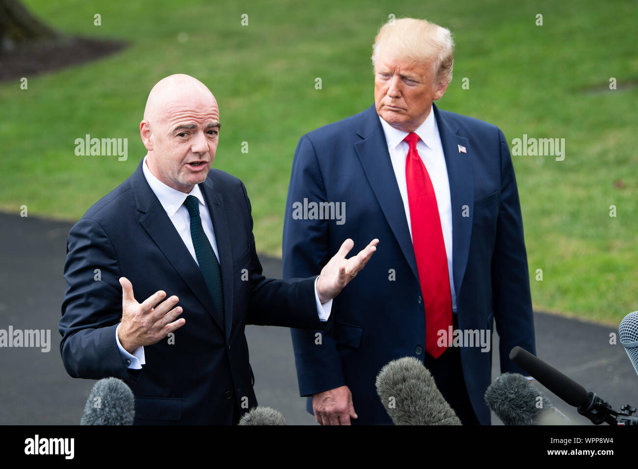 Washington DC, USA. 09th Sep, 2019. President Donald Trump (R) and FIFA President Gianni Infantino speak to the media as Trump departs the White House for a rally in North Carolina, in Washington, DC on Monday, September 9, 2019. Photo by Kevin Dietsch/UPI Credit: UPI/Alamy Live News Stock Photo