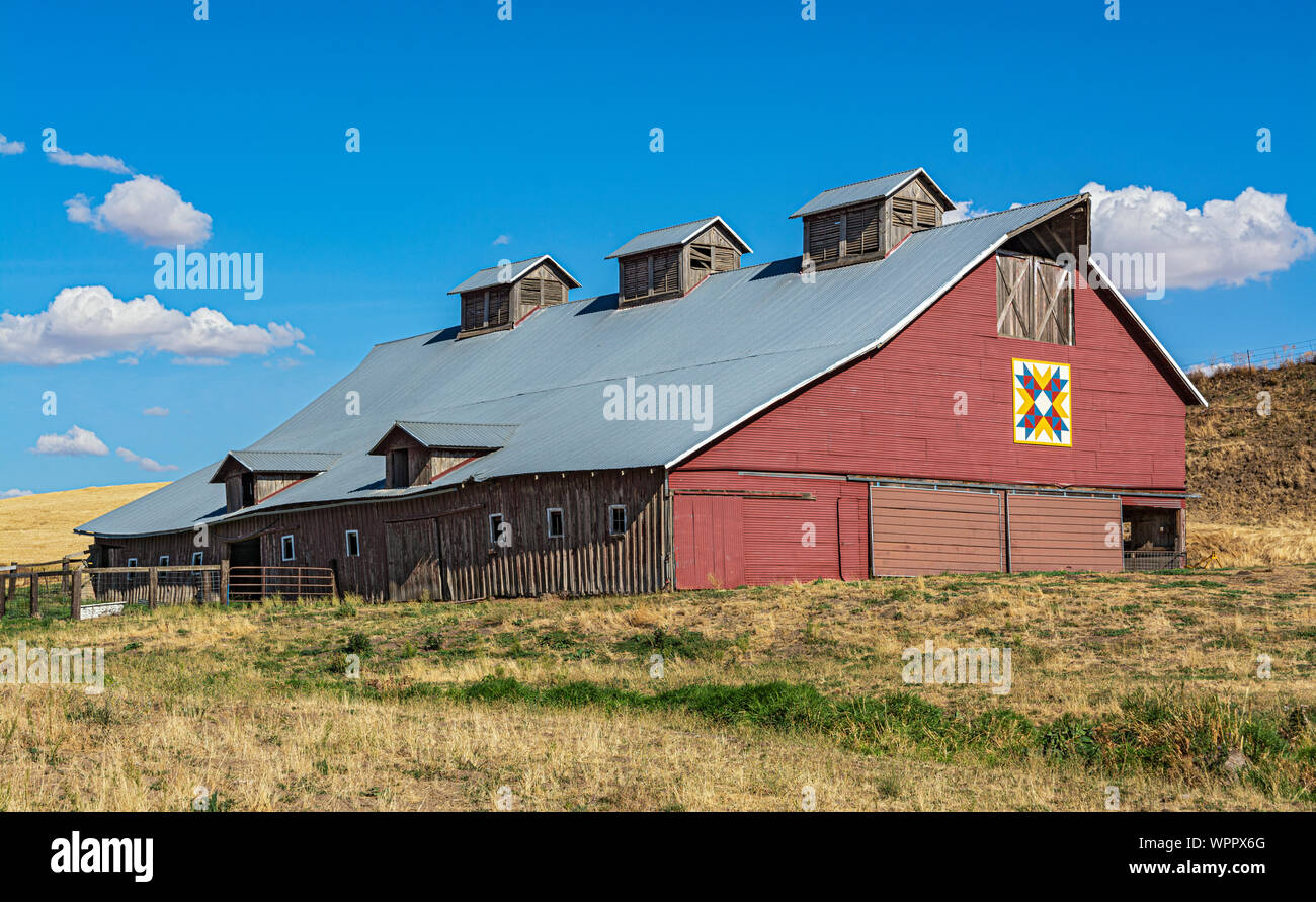 Washington, Palouse Region, Garfield County, red barn, fall season after harvest Stock Photo