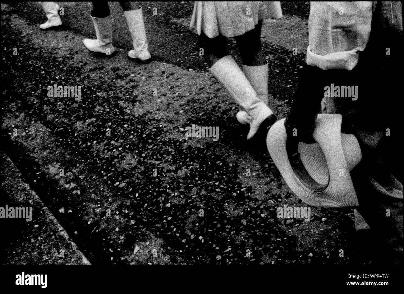 women wearing white boots