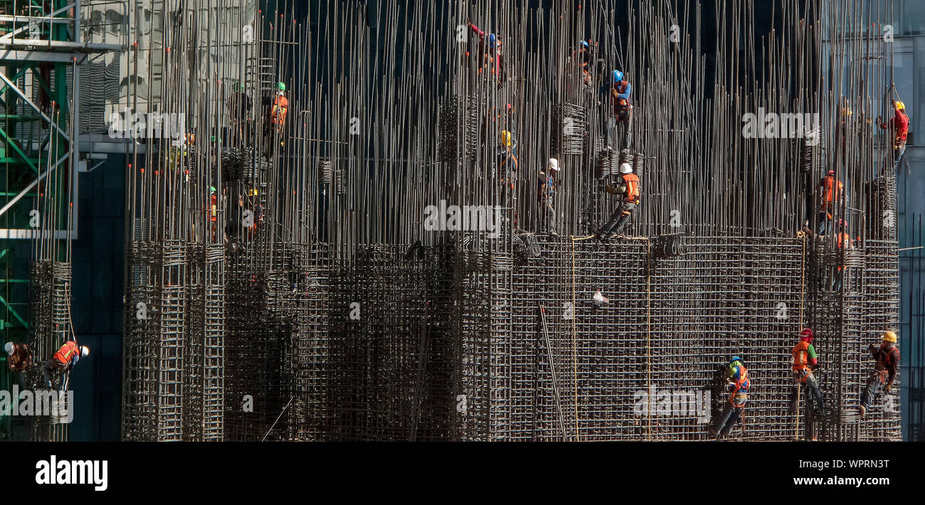 Construction workers on a building site in Mexico City Stock Photo