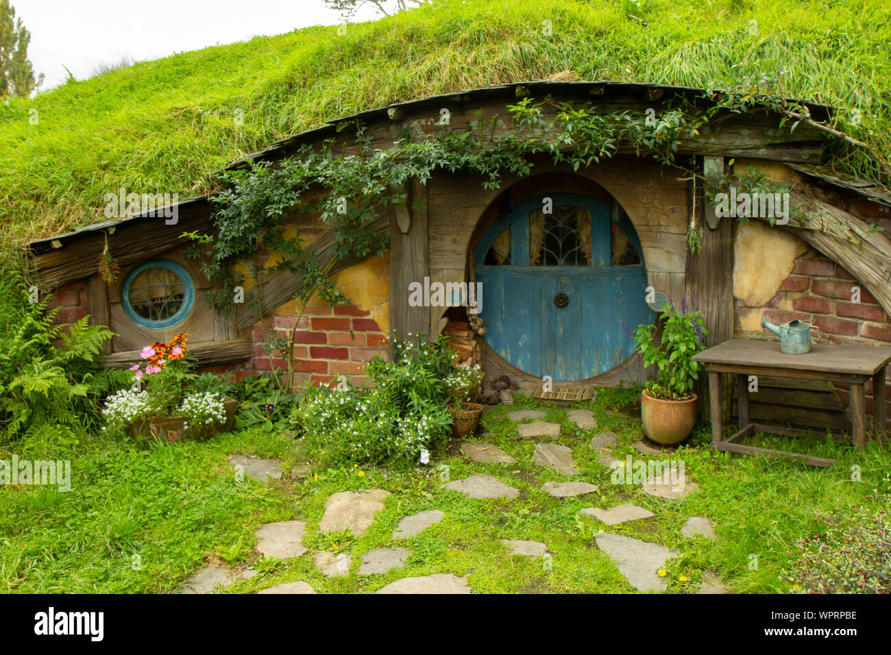 2017, May 2nd, New Zealand, Matamata, Hobbiton movie set - Front door of the hole, Hobbit house Stock Photo