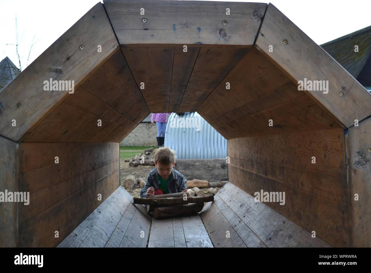 Boy Holding Firewood Stock Photos Boy Holding Firewood Stock