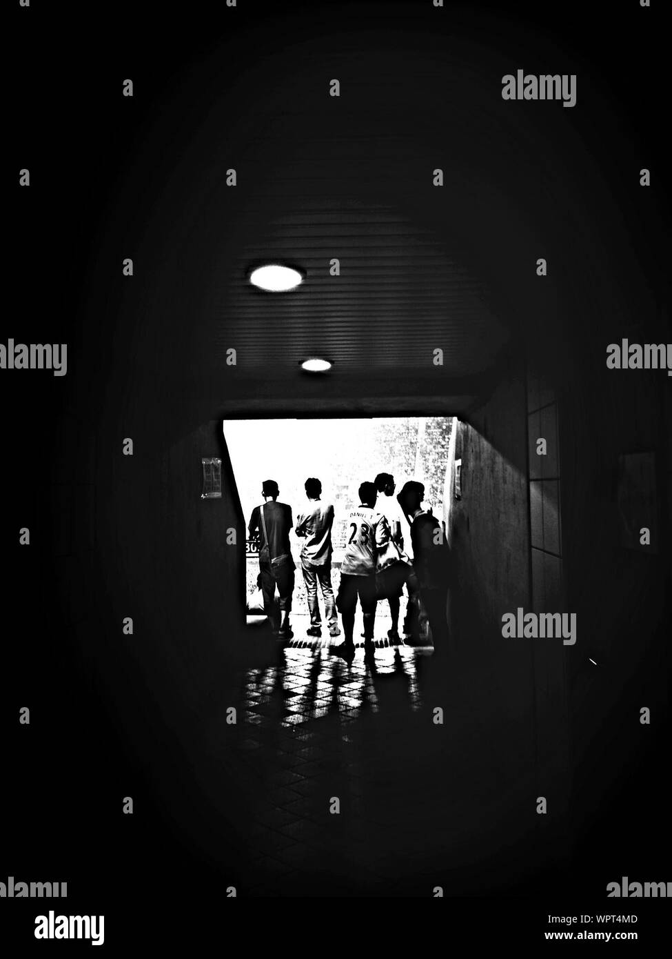 Group Of Teenage Boys In Tunnel Stock Photo