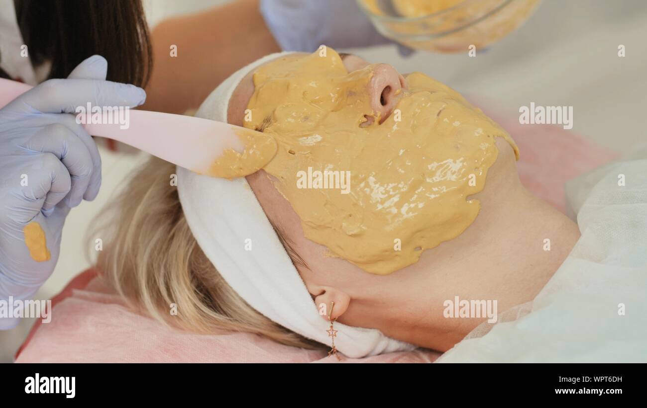 Download Drawing A Yellow Mask On The Girl S Face Stock Photo Alamy PSD Mockup Templates