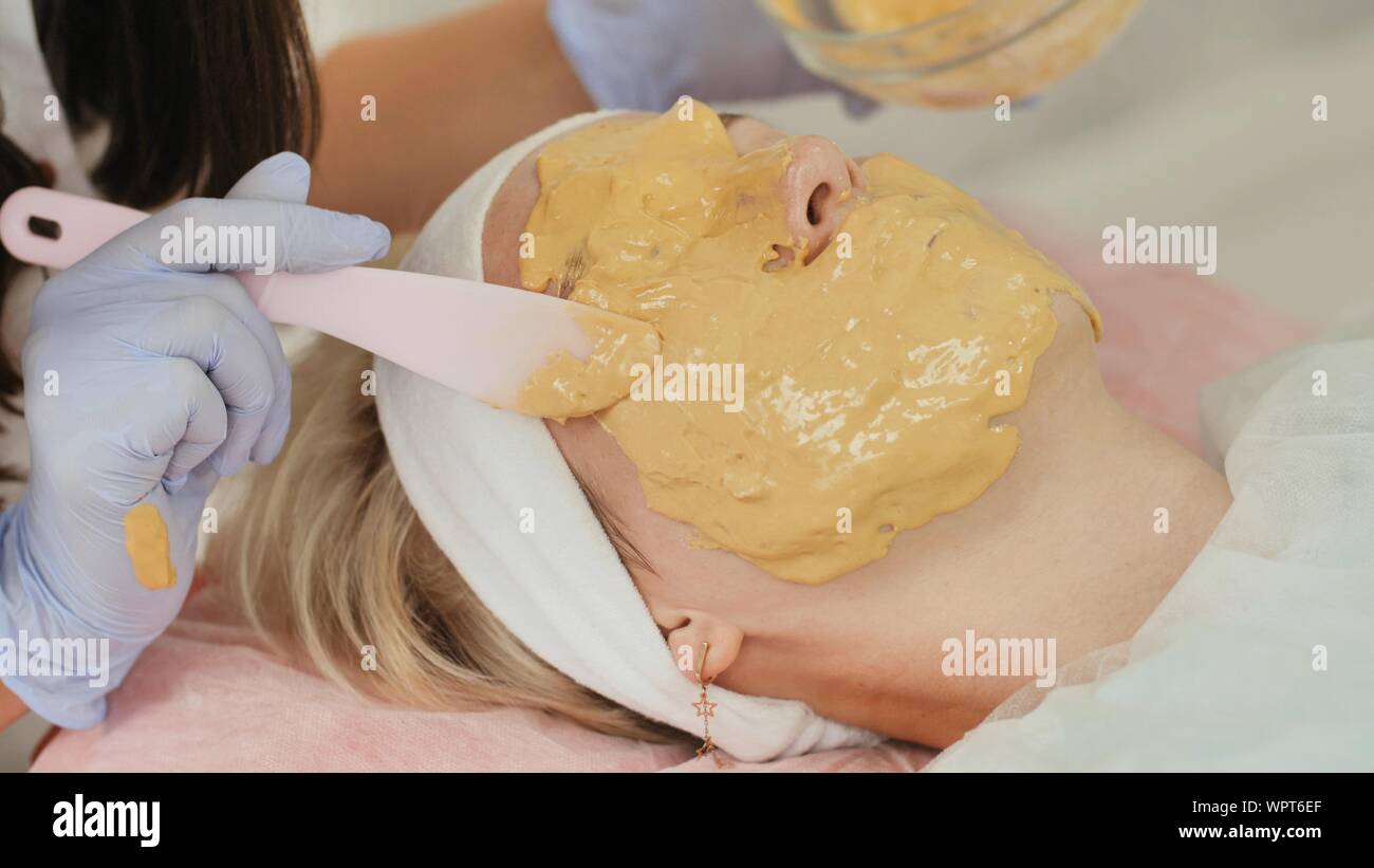 Download Drawing A Yellow Mask On The Girl S Face Stock Photo 272209911 Alamy PSD Mockup Templates