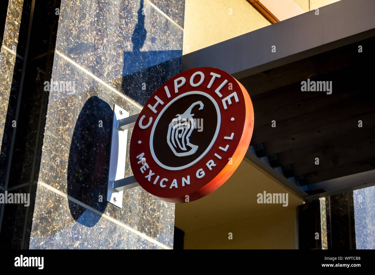 Los Angeles, California, United States - 02-22-2019: A store front sign for the fast food restaurant known as Chipotle Mexican Grill. Stock Photo