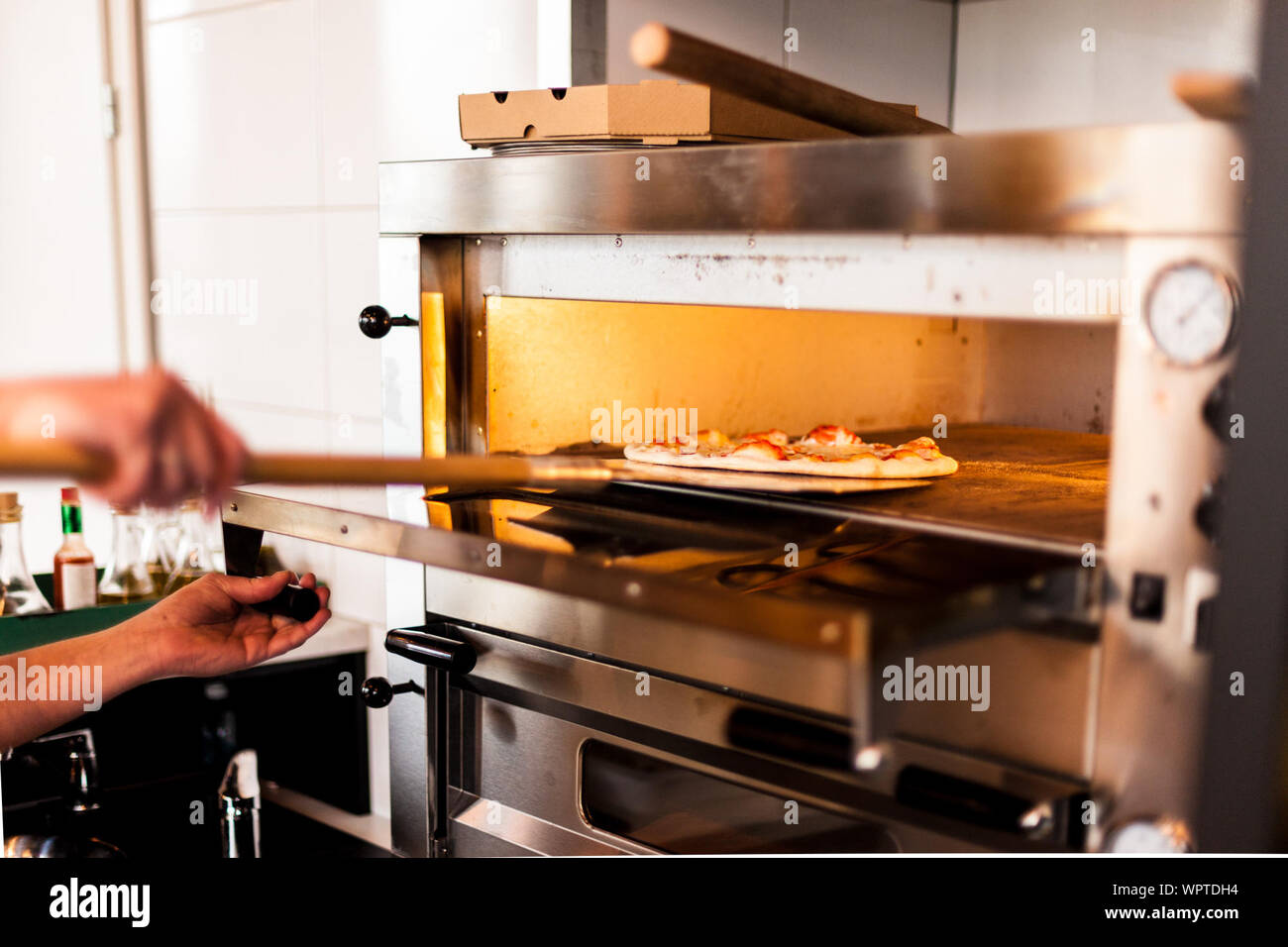 Person Oven Putting Women Stock Photos Person Oven Putting Women