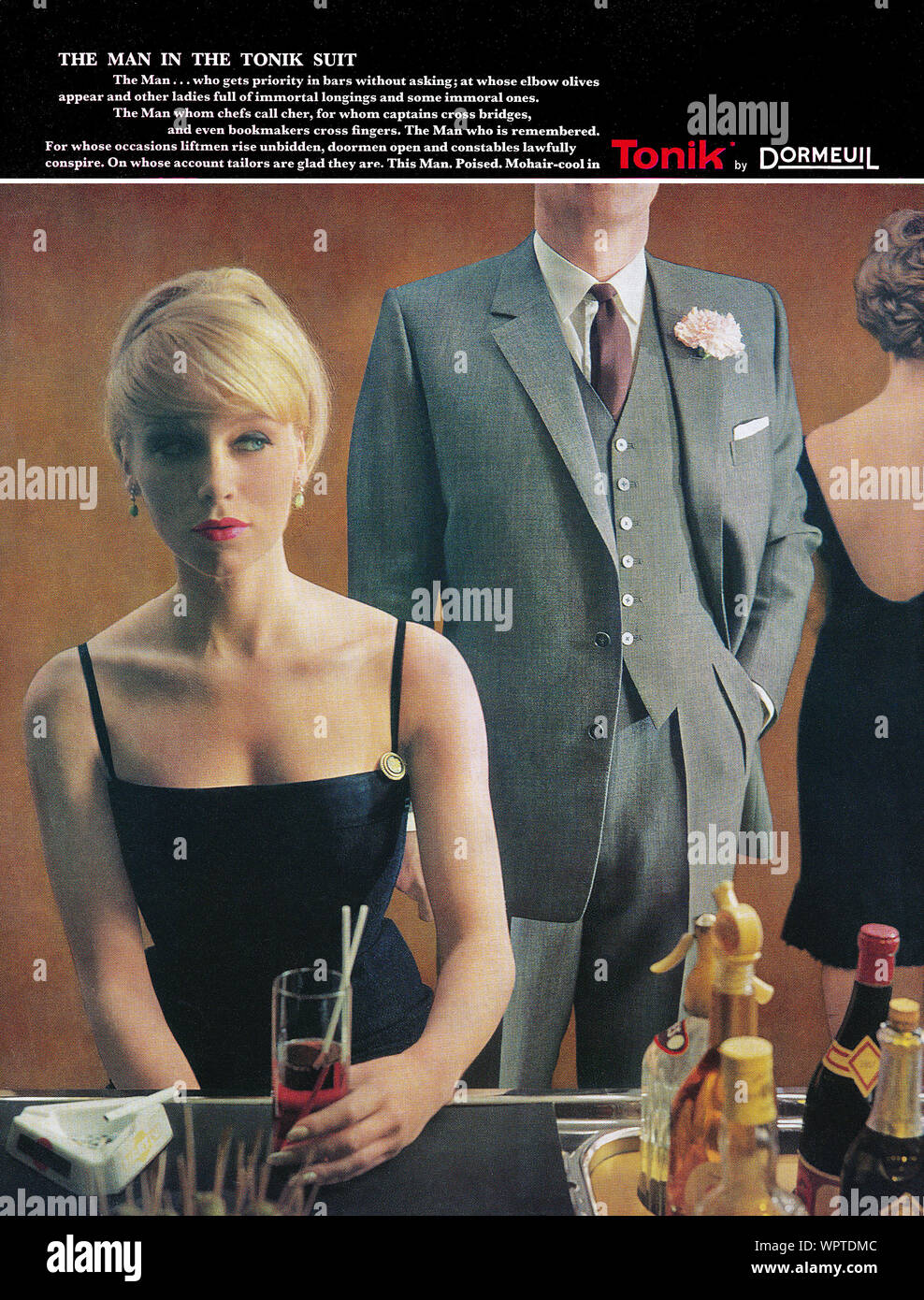 1963 British advertisement for men's mohair Tonik suits by Dormeuil. Stock Photo