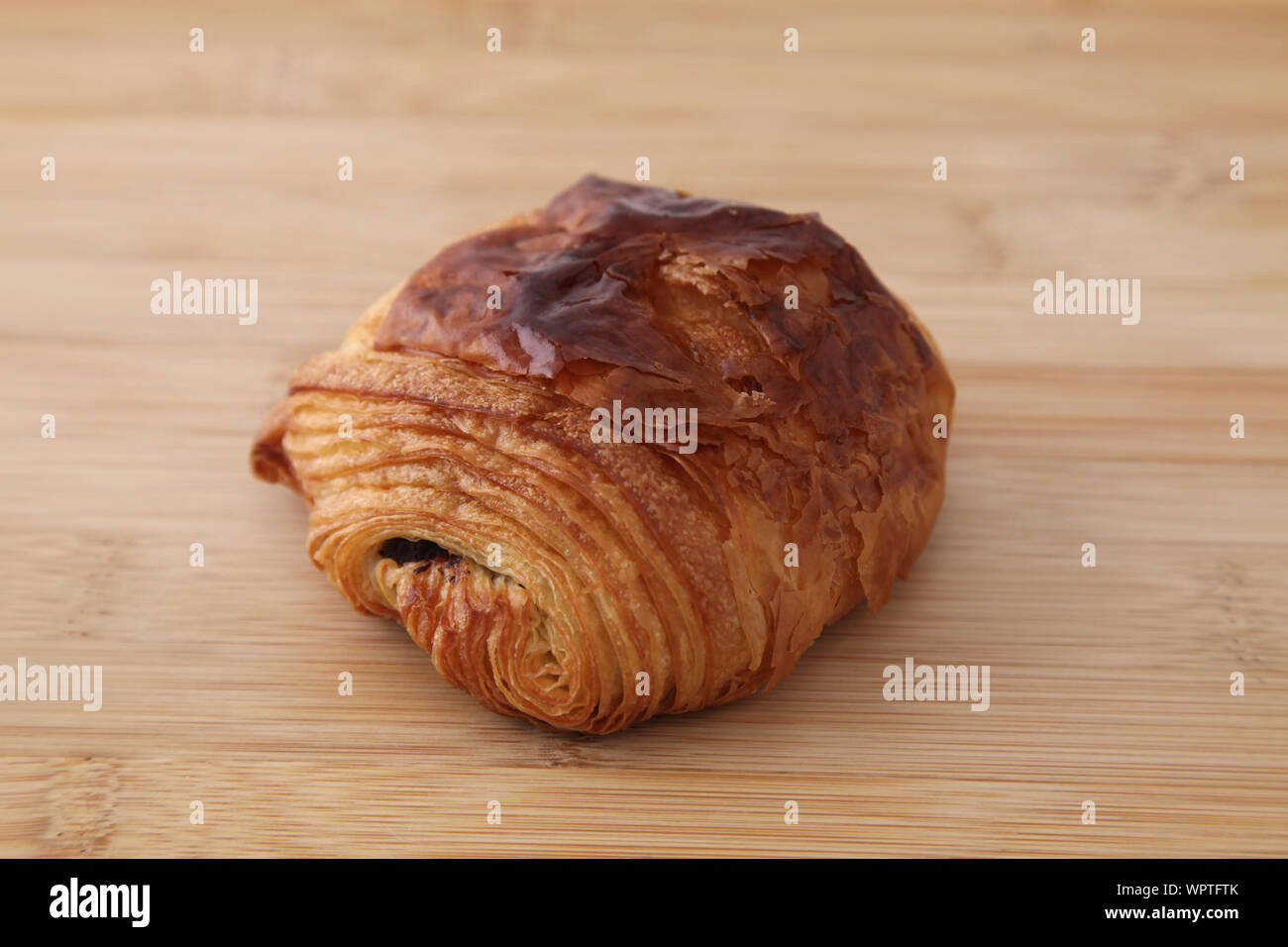french bread pain au chocolat chocolate croissant isolated on table