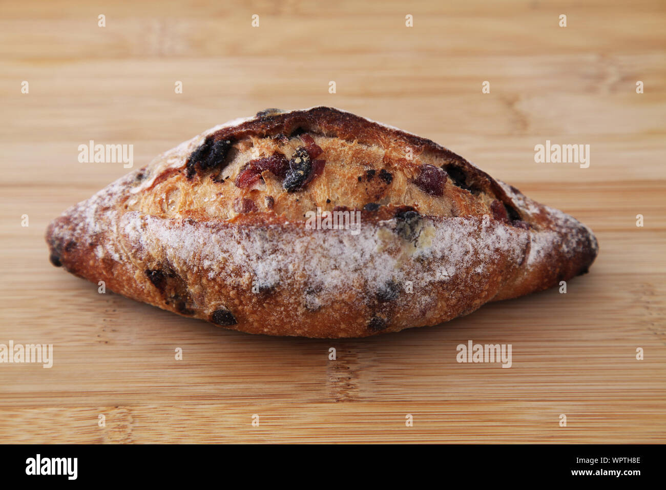 french bread with dried fruit cranberries and choco chips isolated on