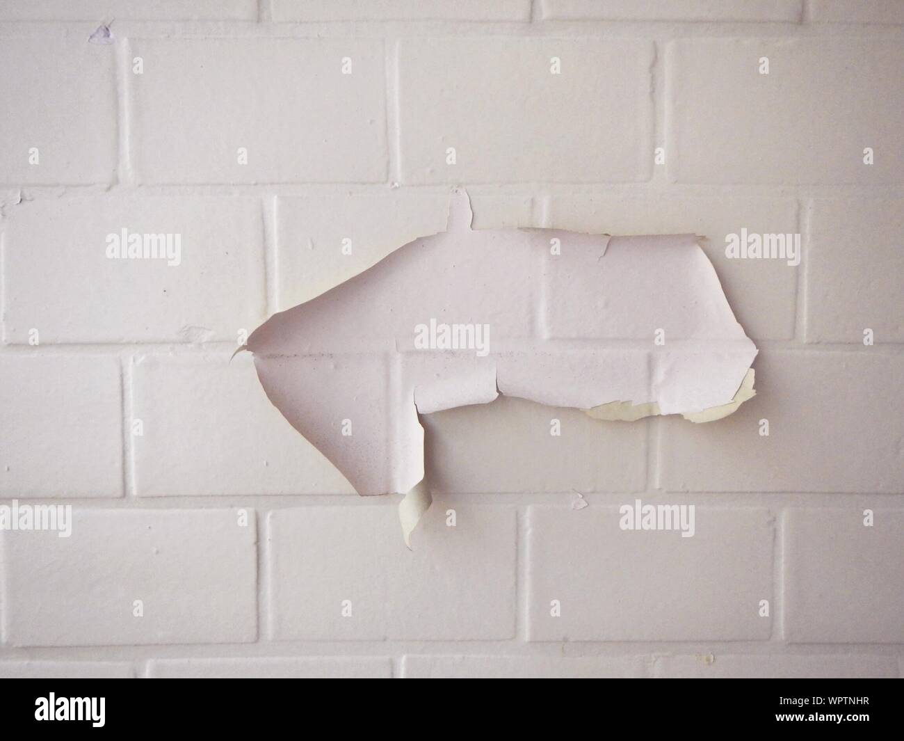 Paper stuck on wall hires stock photography and images Alamy