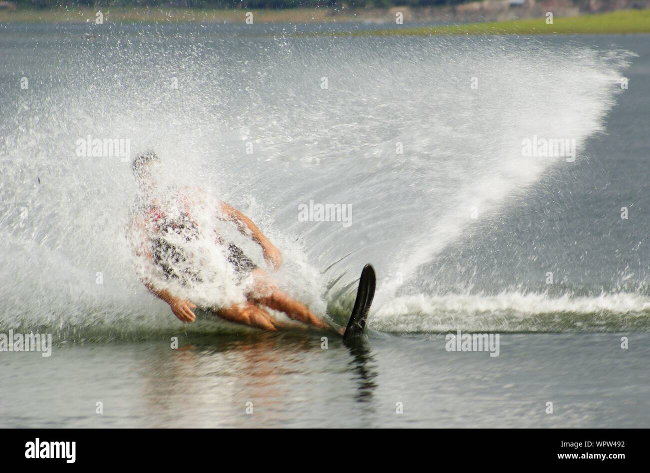Man Wakeboarding In Lake Stock Photo
