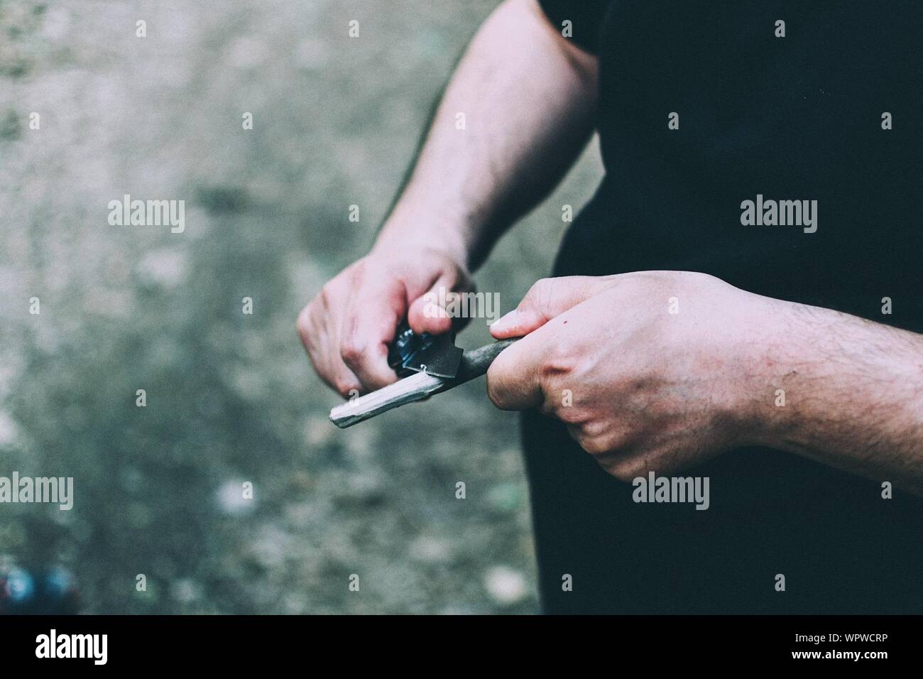 Knife sharpening man hires stock photography and images Alamy