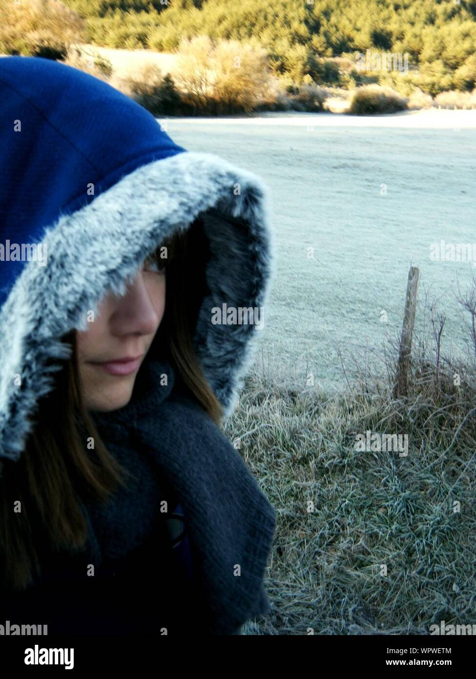 Wearing blue hood hi-res stock photography and images - Alamy