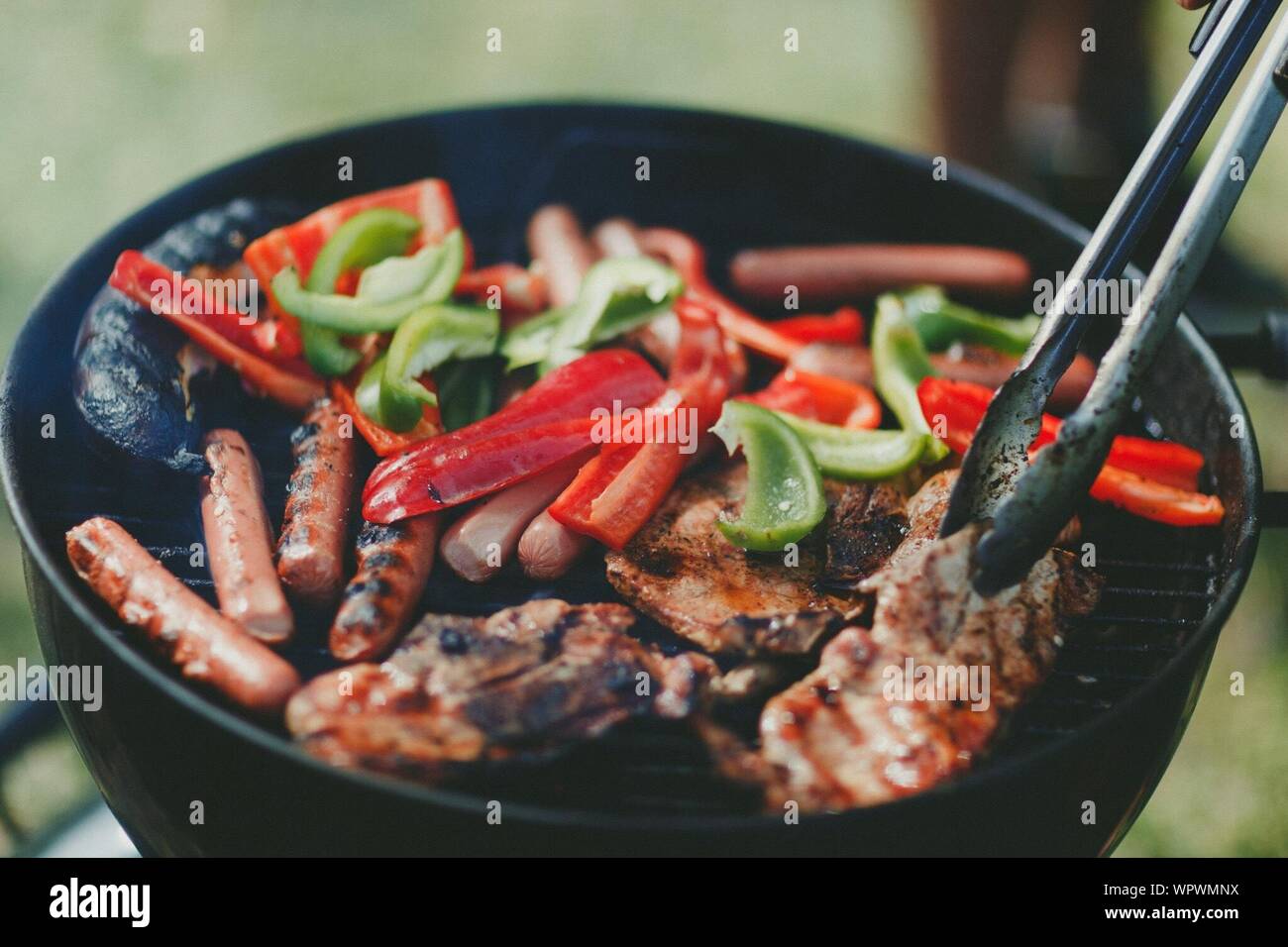 Close-up Of Food Grilling On Barbecue Stock Photo