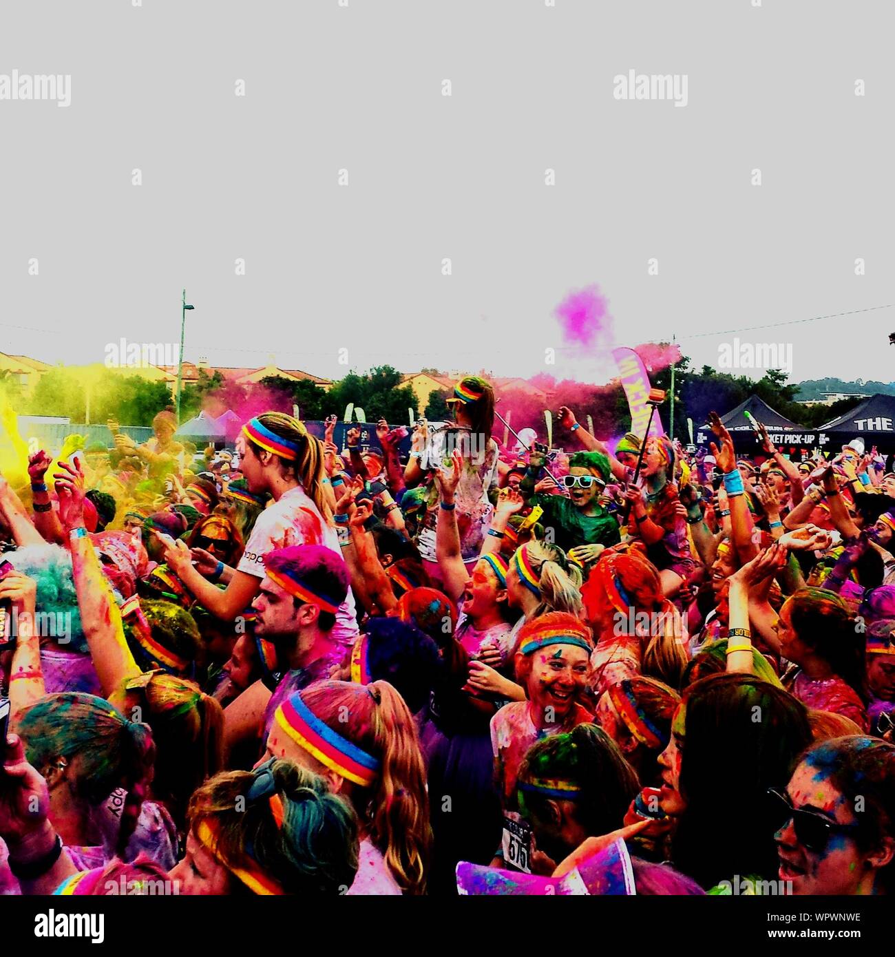 Crowd Of People During Color Run Stock Photo