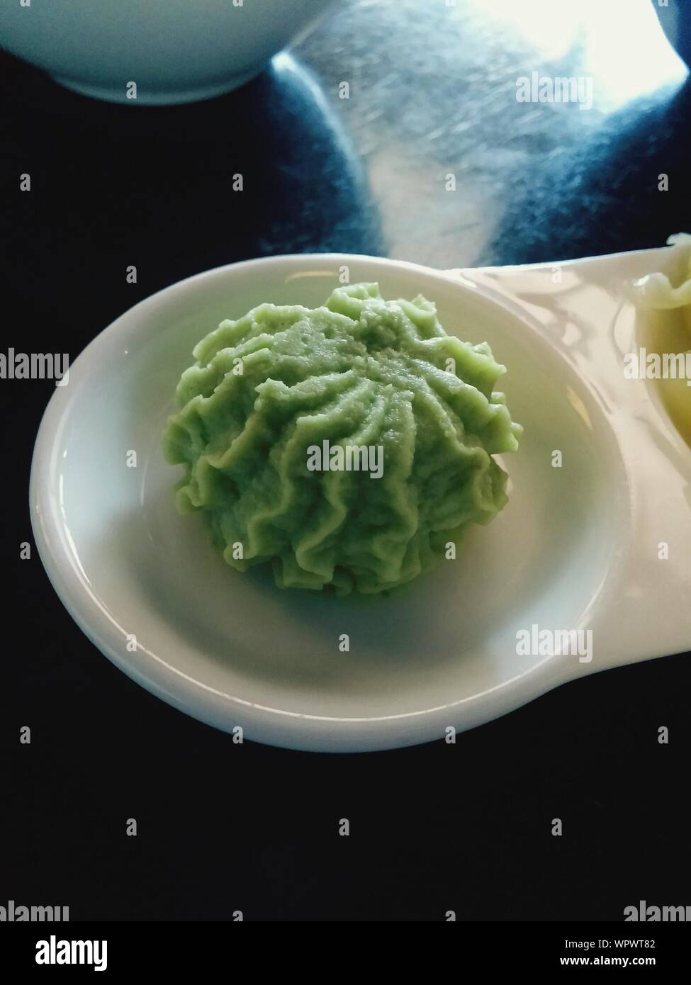 Green Ice Cream On Plate Stock Photo