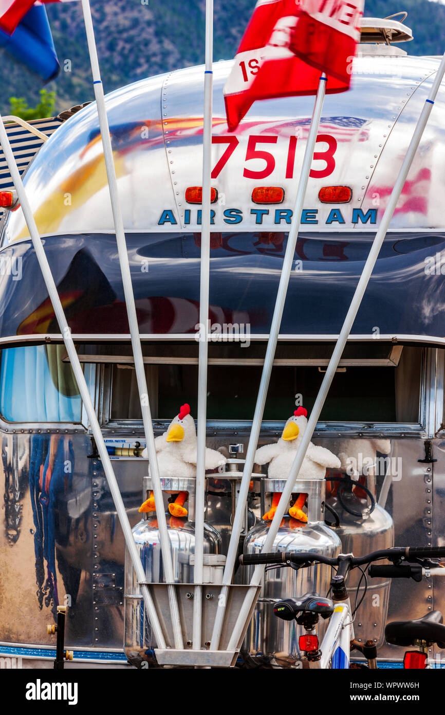 Toy chickens mounted on Airstream camping trailers at the Vintage Airstream Club Rocky Mountain Rally Stock Photo