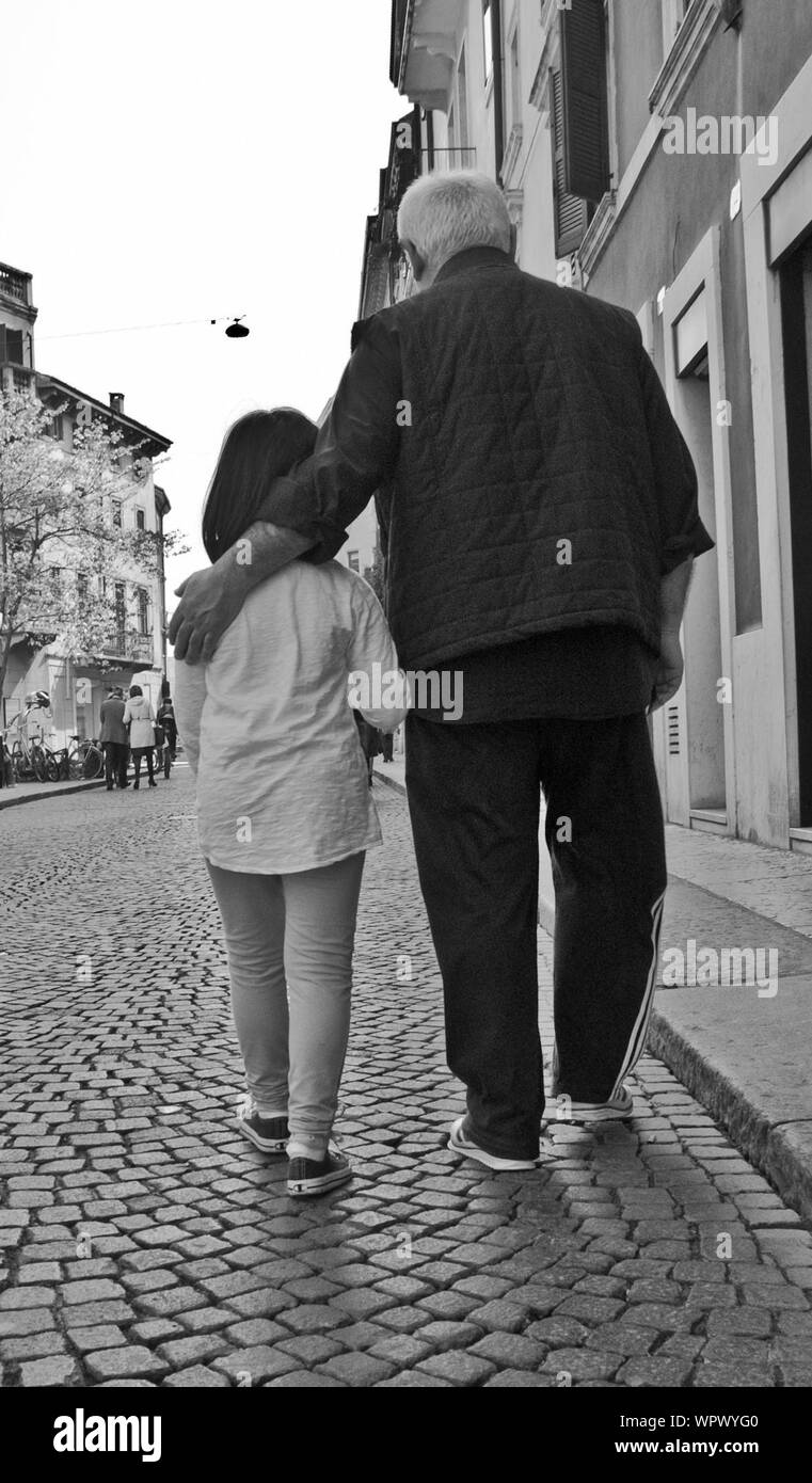 Granddaughter Touching Granddad Granddaughter Touching Granddad