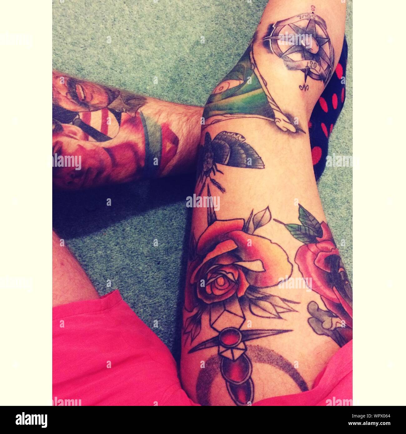Leg tattoos hi-res stock photography and images - Alamy
