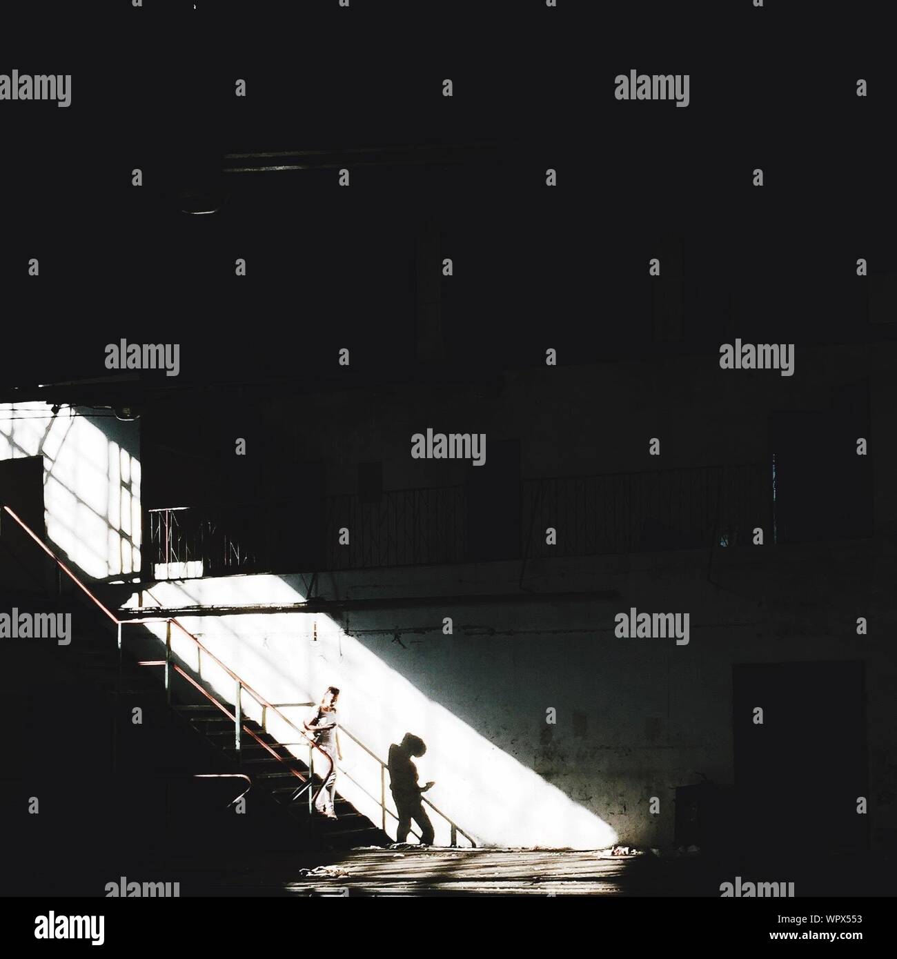 Climbing down steps hires stock photography and images Alamy