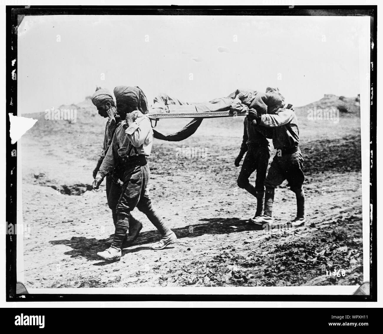 Man being carried on stretcher Cut Out Stock Images & Pictures Alamy