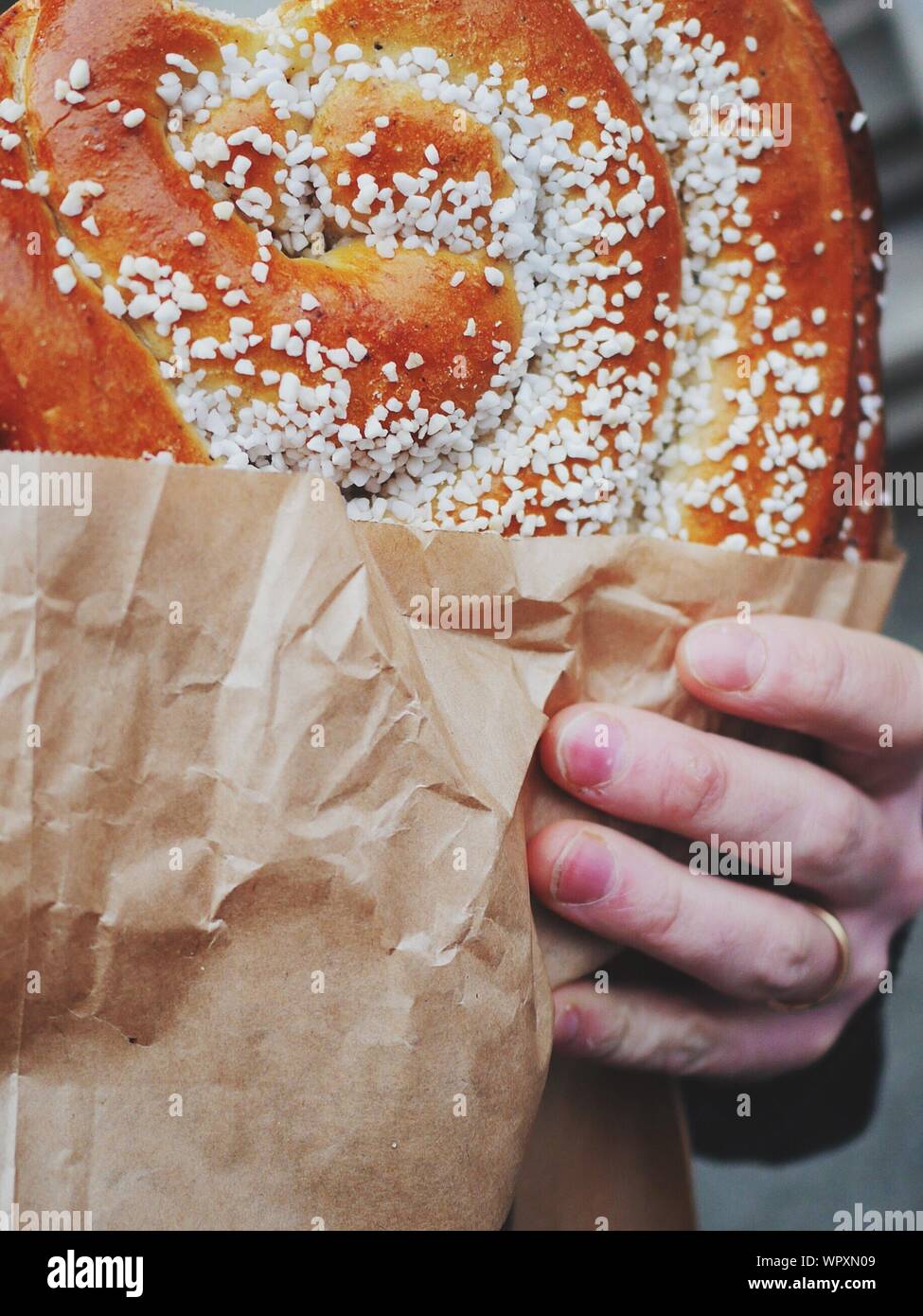 Human hand holding wax hand hires stock photography and images Alamy