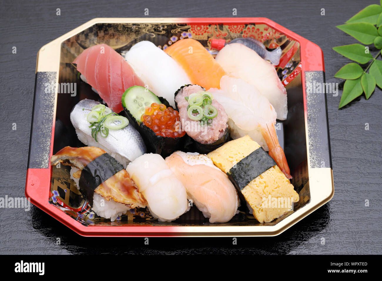 Japanese sushi bento, lunch pack on black background Stock Photo