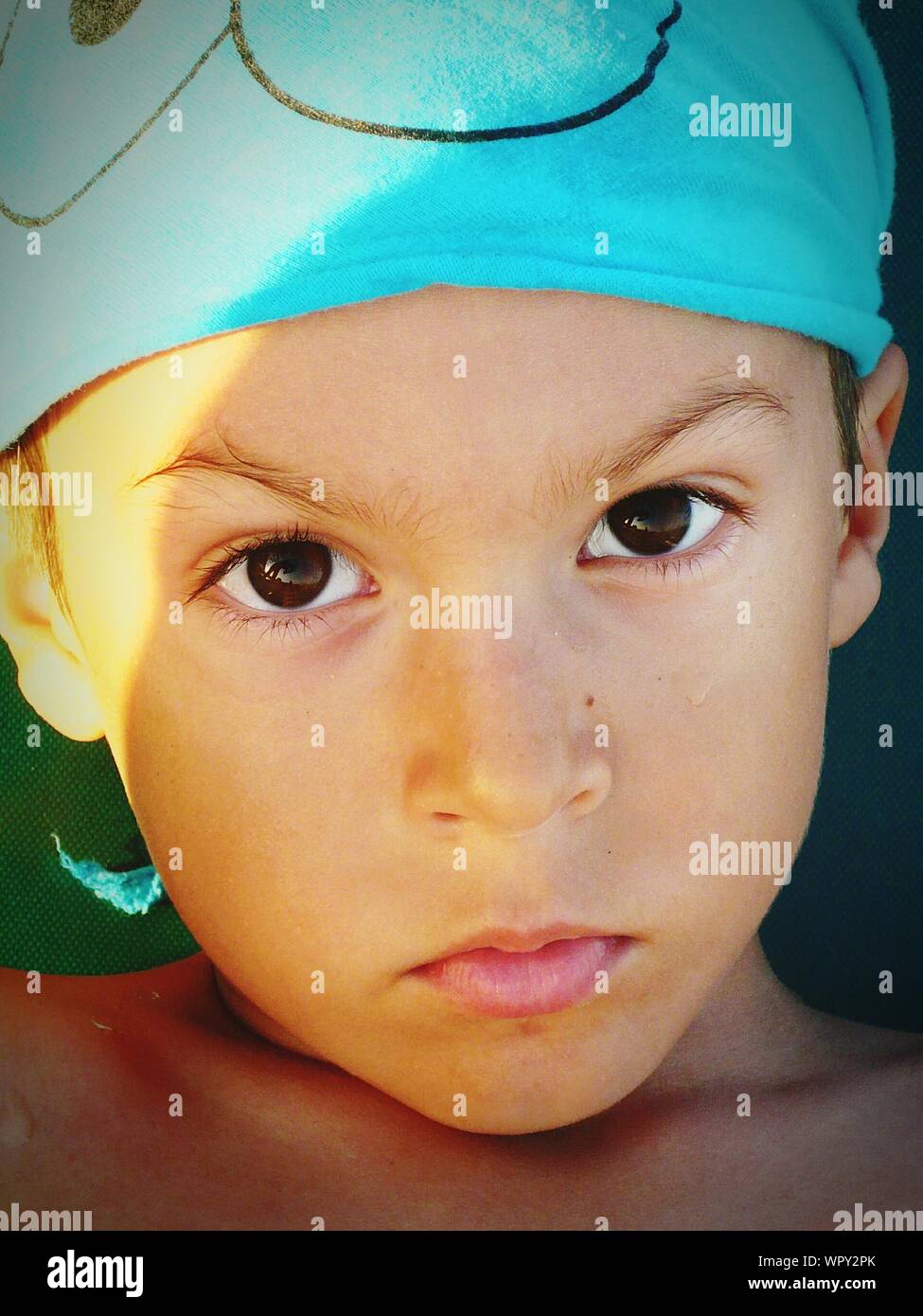 Close-up Portrait Of Cute Boy Stock Photo