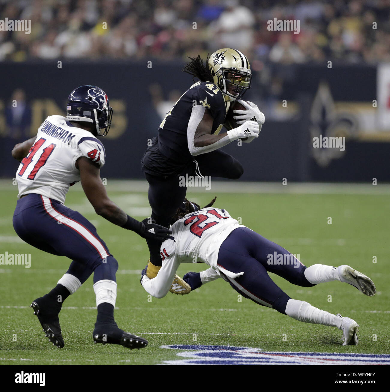 New Orleans, United States. 09th Sep, 2019. Houston Texans cornerback Bradley Roby (21) tackles New Orleans Saints running back Alvin Kamara (41) after a short gain at the Louisiana Supedome in New Orleans on Monday, September 9, 2019. Photo by AJ Sisco/UPI Credit: UPI/Alamy Live News Stock Photo