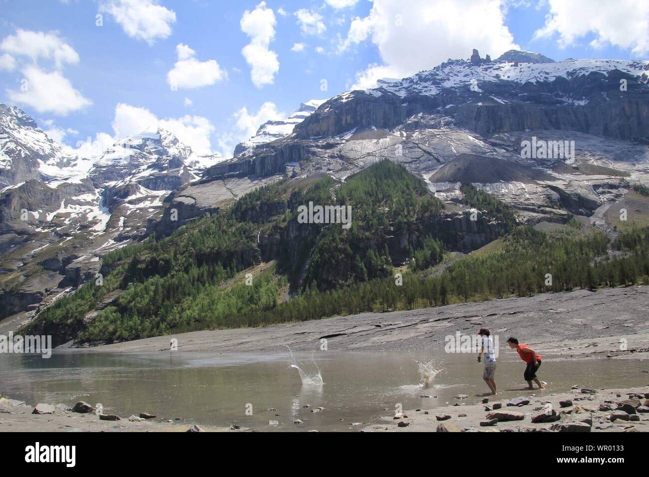 Boys in river hi-res stock photography and images - Alamy