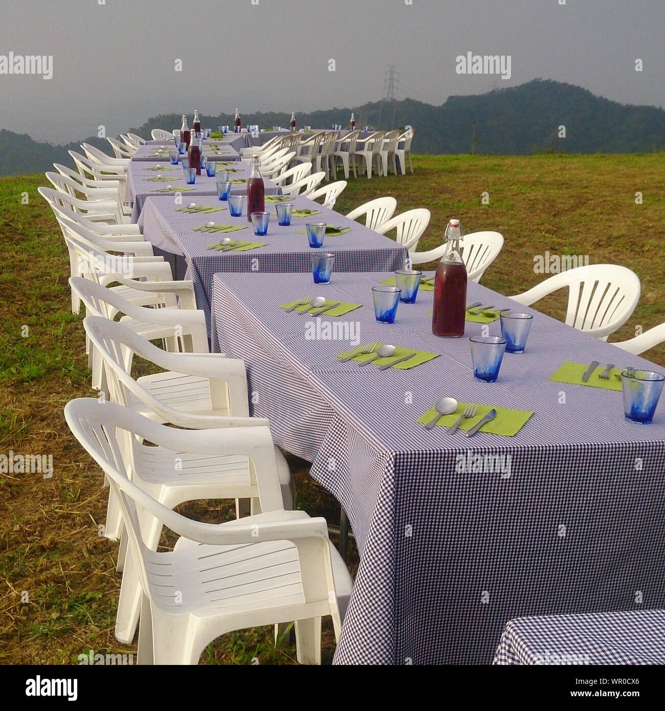 Row of plastic chairs hi-res stock photography and images - Alamy