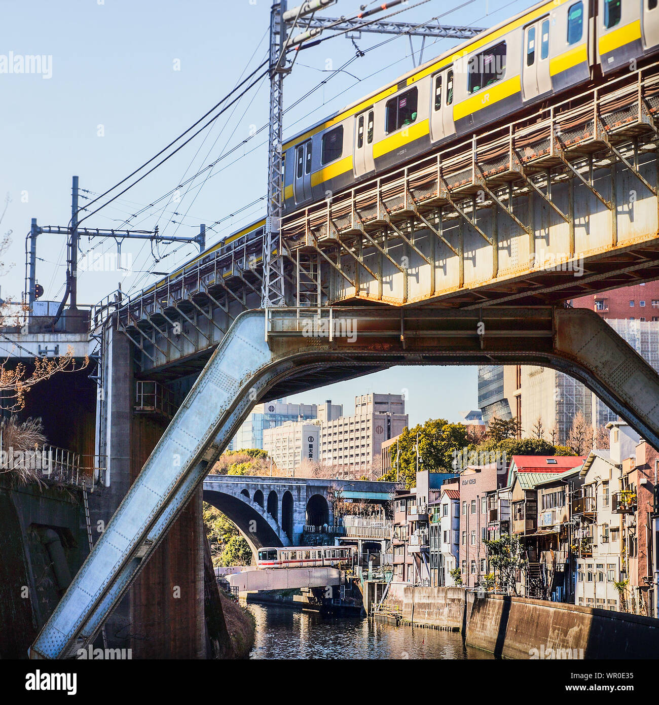 Elevated Metro Train Bridge Above Canal Stock Photo