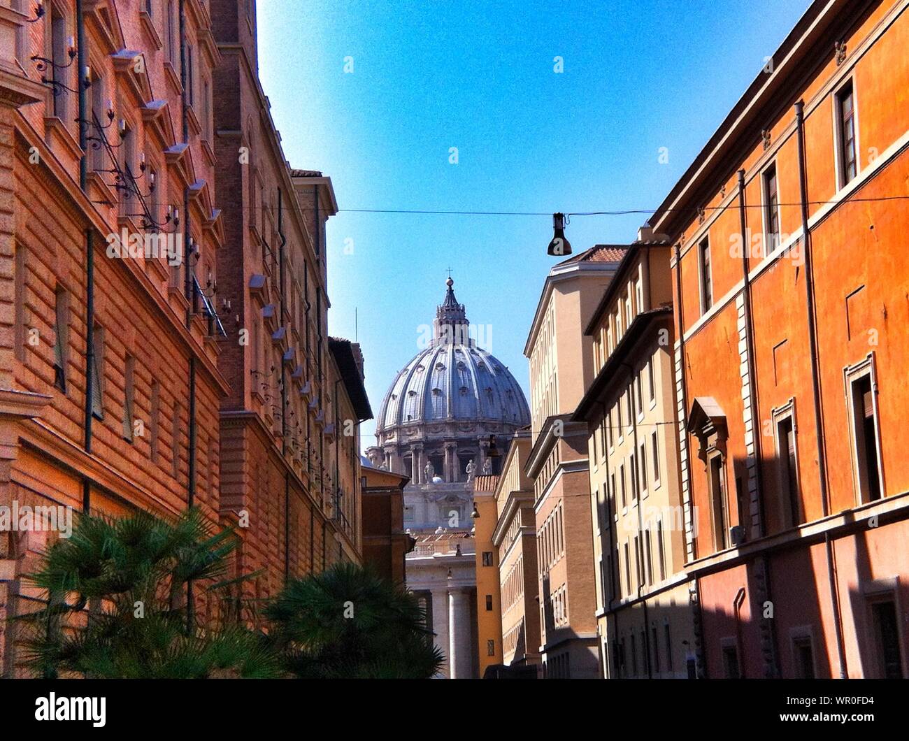Side View Of Buildings Against Domed Structure Stock Photo