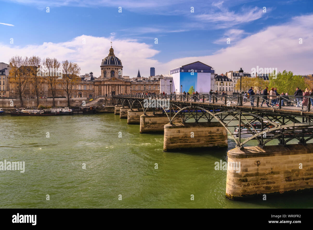 Paris France city skyline at Pont des Arts Bridge and Seine River Stock Photo