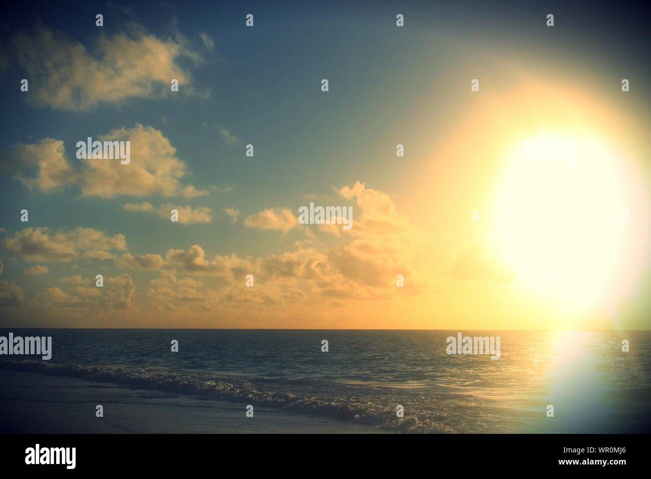 Sun shining on wave hi-res stock photography and images - Alamy