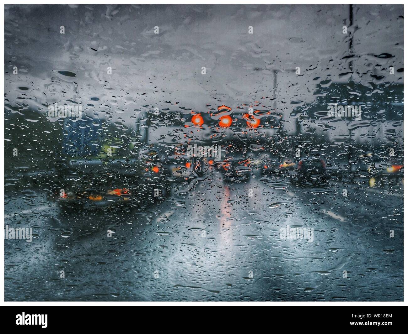 Car through rainy window Cut Out Stock Images & Pictures - Alamy