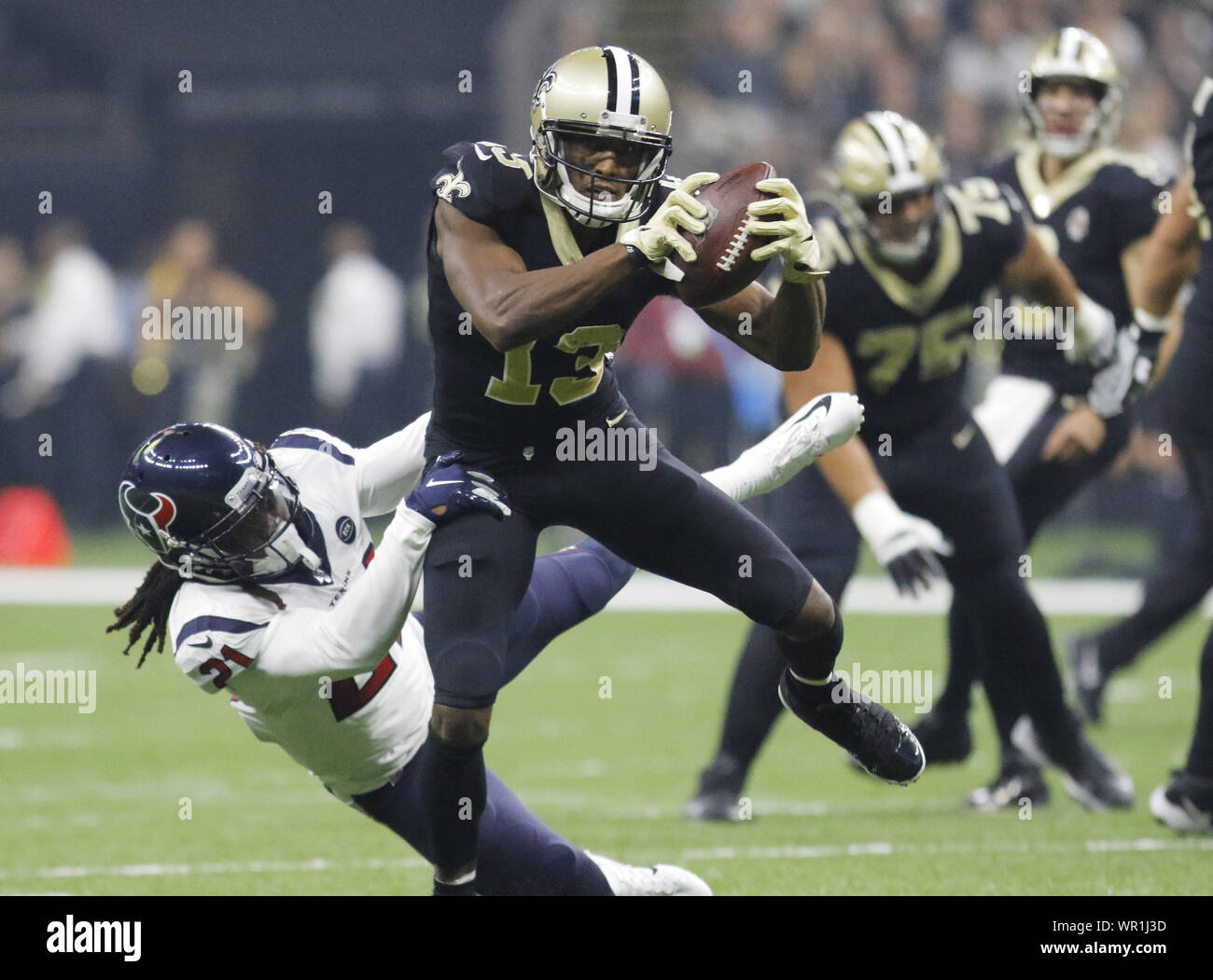 New Orleans, LOUISIANA, USA. 9th Sep, 2019. (top to bottom) New Orleans Saints wide receiver Michael Thomas is tackled by Houston Texans cornerback Bradley Roby in New Orleans, Louisiana USA on September 9, 2019. The Saints beat the Texans 30-28. Credit: Dan Anderson/ZUMA Wire/Alamy Live News Stock Photo