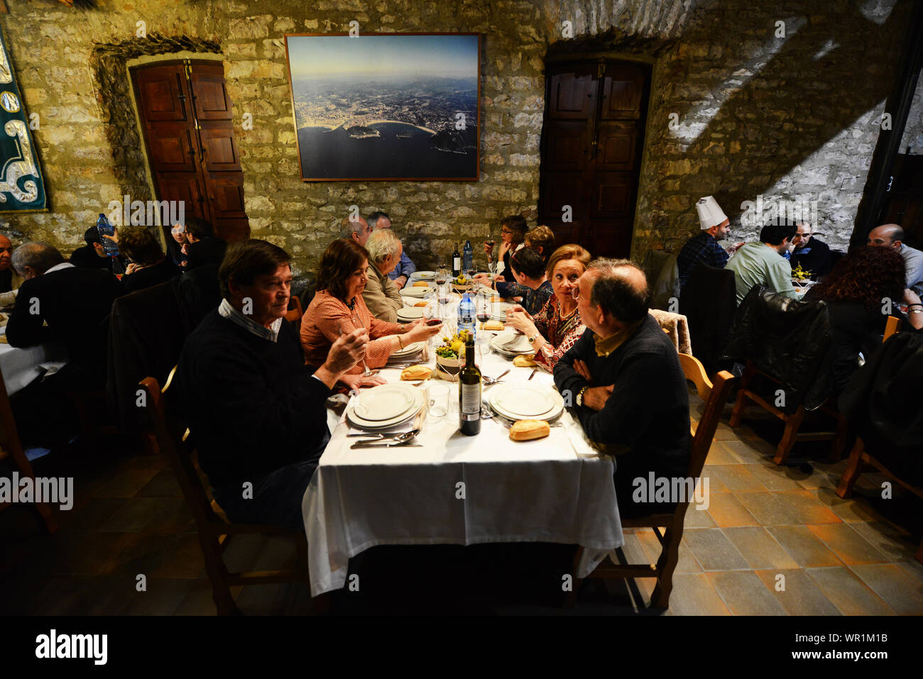 A feast at the Gastronomic club in the old town of San Sebastian. Stock Photo